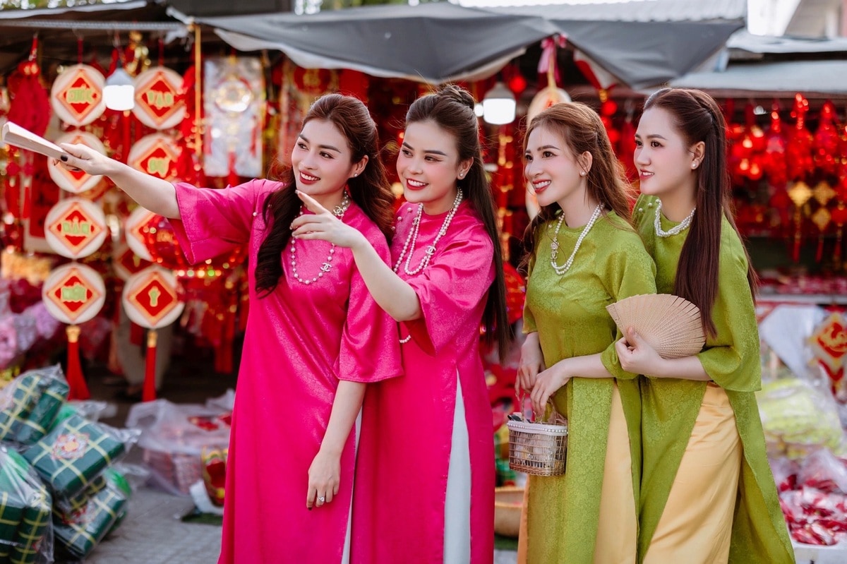 During Lunar New Year, the sight of Vietnamese women in vibrant ao dai has become an enduring symbol of celebration